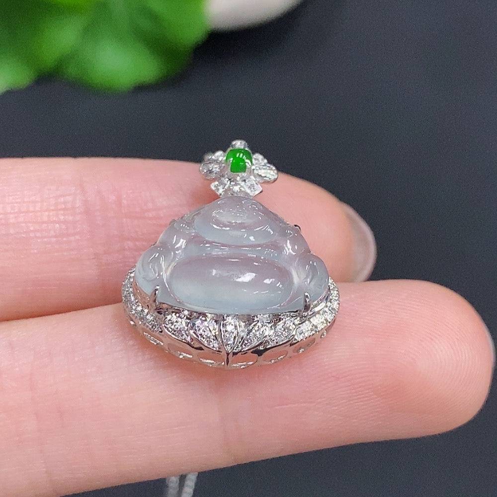Jadeite Buddha pendant with 18k gold accents and diamond details, showcasing intricate craftsmanship and luminous green jade.
