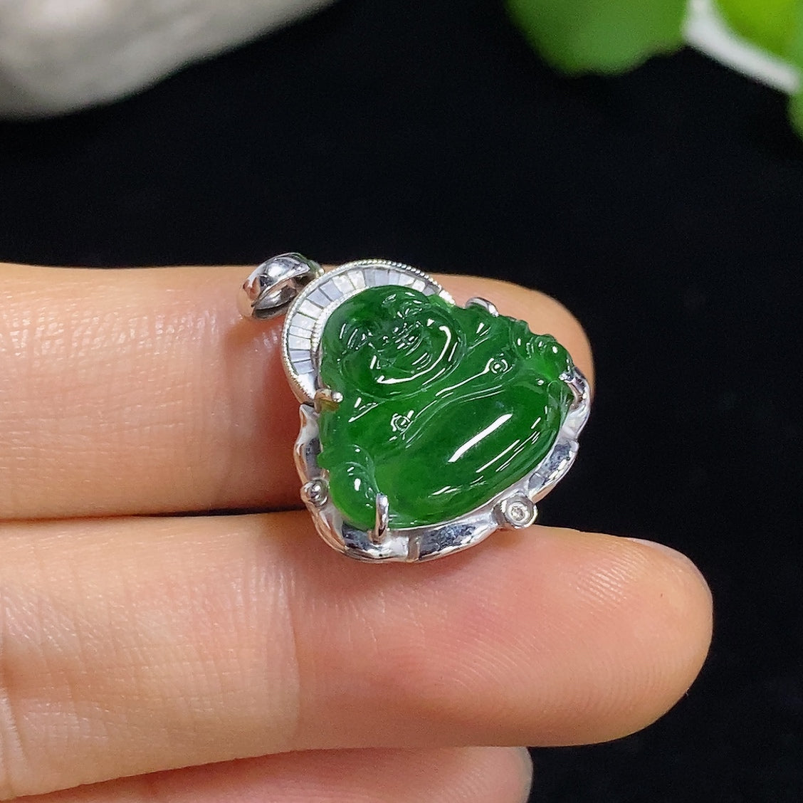 Jadeite Buddha pendant with 18K gold and diamond accents, elegant necklace featuring a detailed Buddha charm.