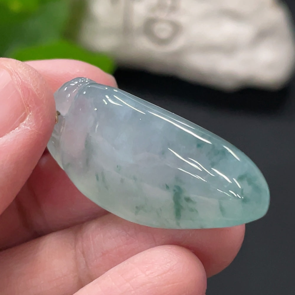 Huiliu Jadeite auspicious melon pendant with diamond-accent clasp, crafted from high-quality jade for elegant jewelry.