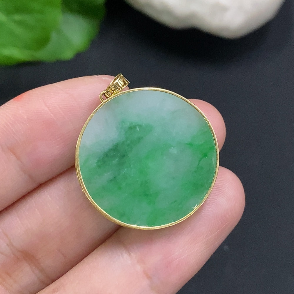 Jadeite pendant with 18K gold mounting, plain design, weight approximately 5.2g, featuring a smooth, polished jade gemstone.