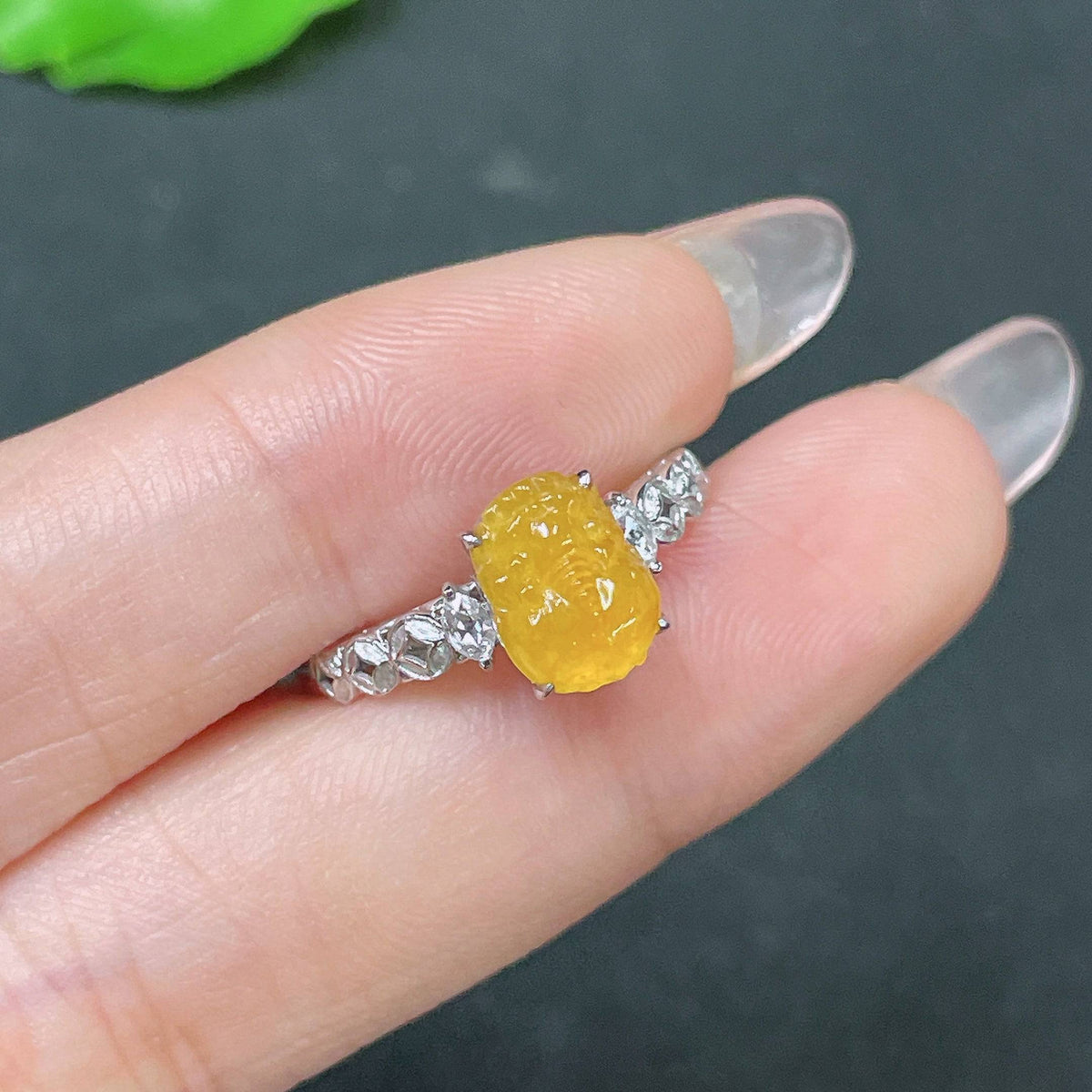 Jadeite inlay ring by HUILIU HQ with 18k gold accents, diamond details, size 13, weighing approximately 2.31g.