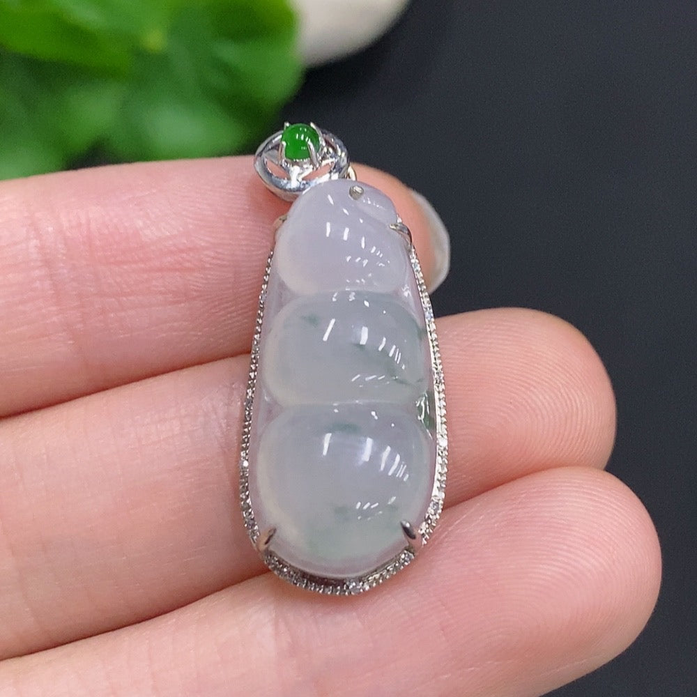 Jadeite lucky bean pendant with diamond accents, 18k gold, from HUILIU HQ, showcasing the detailed jade design and gold setting.