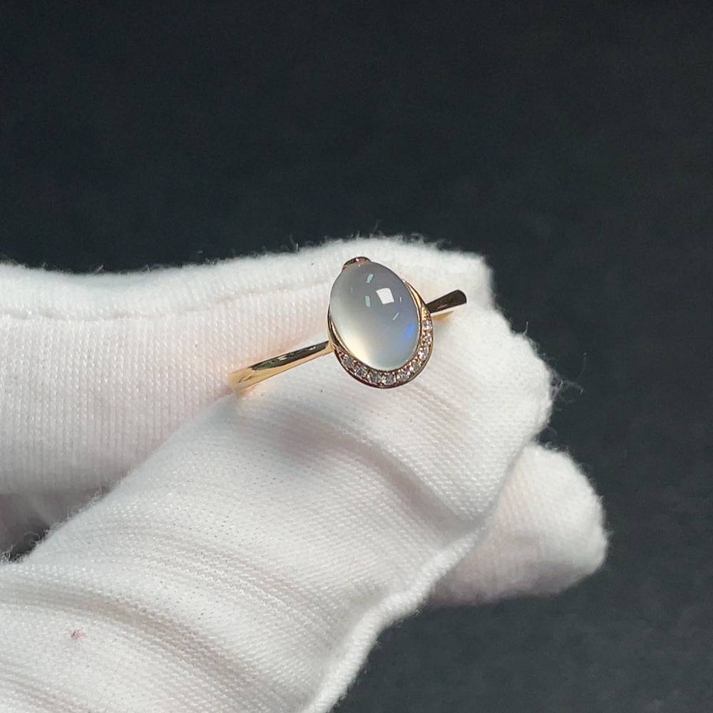 Huiliu gemstone ring featuring a moonstone with visible organic matter, showcasing natural beauty and unique gemstone details.