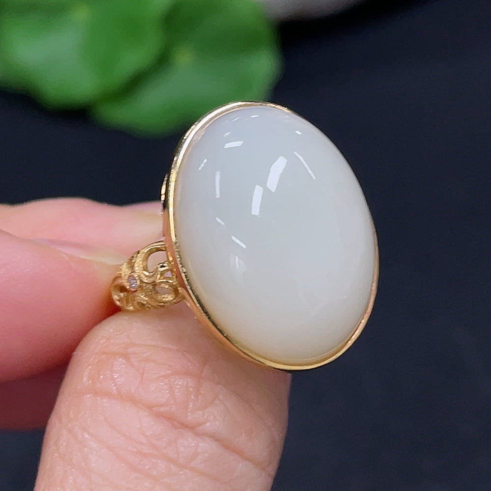 Elegant Hetian Jade cabochon inlaid ring by HKHQ featuring smooth jade stone set in a polished silver band.