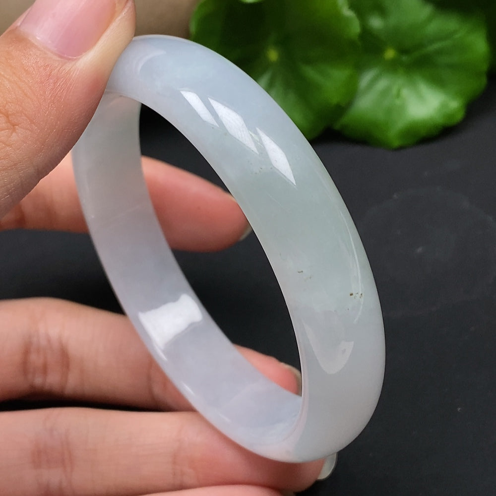 HKHQ Jadeite round bangle size 56.5, crafted from jade with a total weight of 43.17g, showcasing smooth, polished surface.