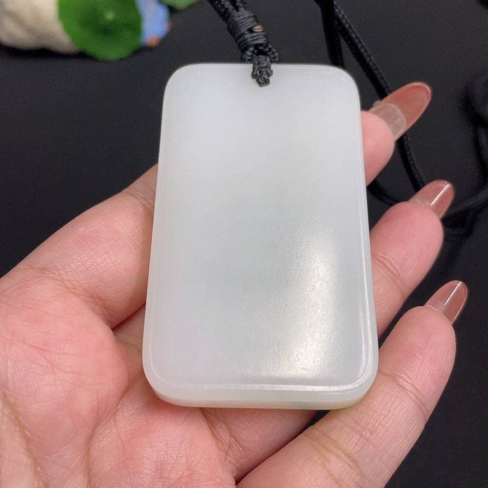 Huiliu certified Hetian jade Guanyin pendant with rope, showcasing intricate carved details on smooth, polished green jade.