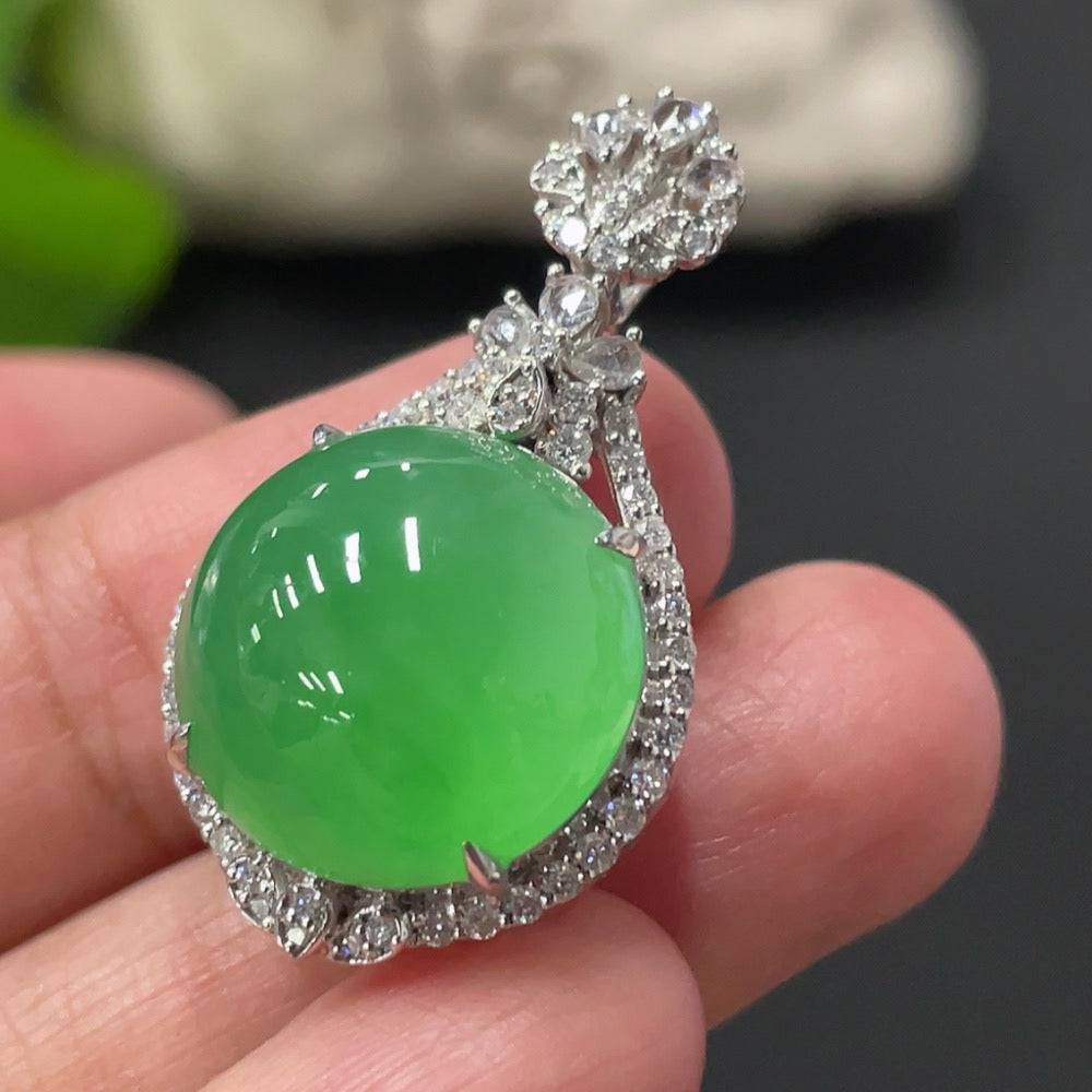 Jadeite cabochon pendant with 18K gold setting and diamond accents, elegant jewelry piece from HUILIU HQ.