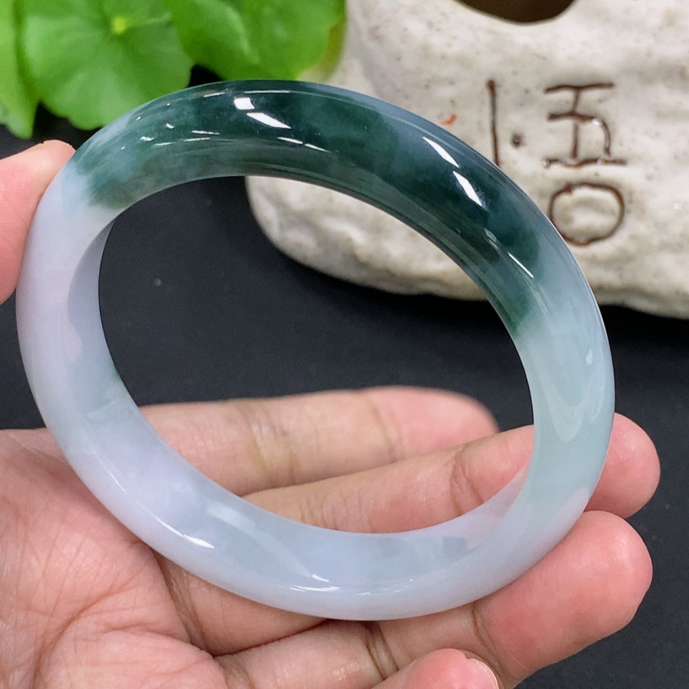 HKHQ jadeite round bangle with a 55.5mm size, weighs approximately 51.68g, featuring smooth, polished jadeite bracelet design