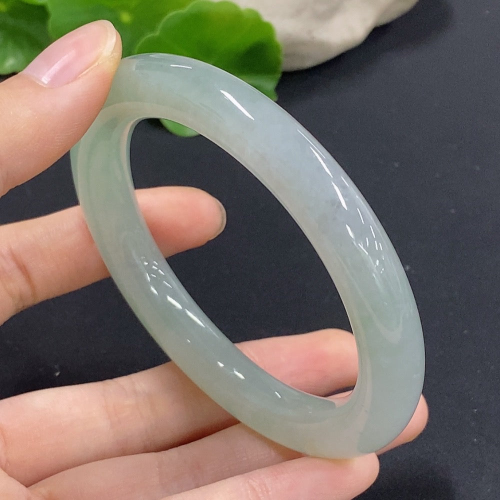 Jadeite round bangle in size 56 with approximately 54.11g weight, crafted by HKHQ, featuring smooth, polished jade surface.
