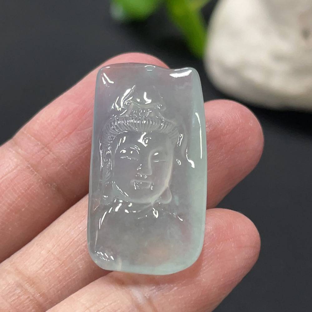 Jadeite Guanyin pendant from HUILIU HQ, detailed carved figure on smooth green jade, weighs approximately 6.2 grams.
