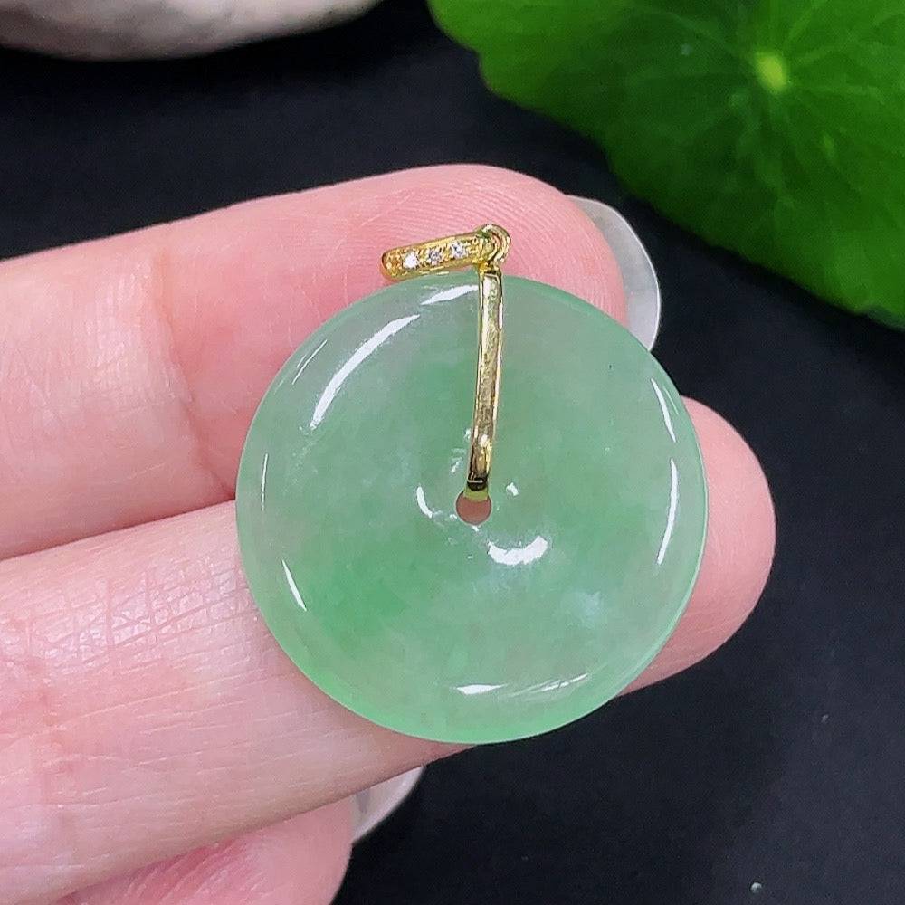 Jadeite Peace Knot pendant with diamond accents on 18K gold, weighing approximately 4.2g, from HUILIU HQ.