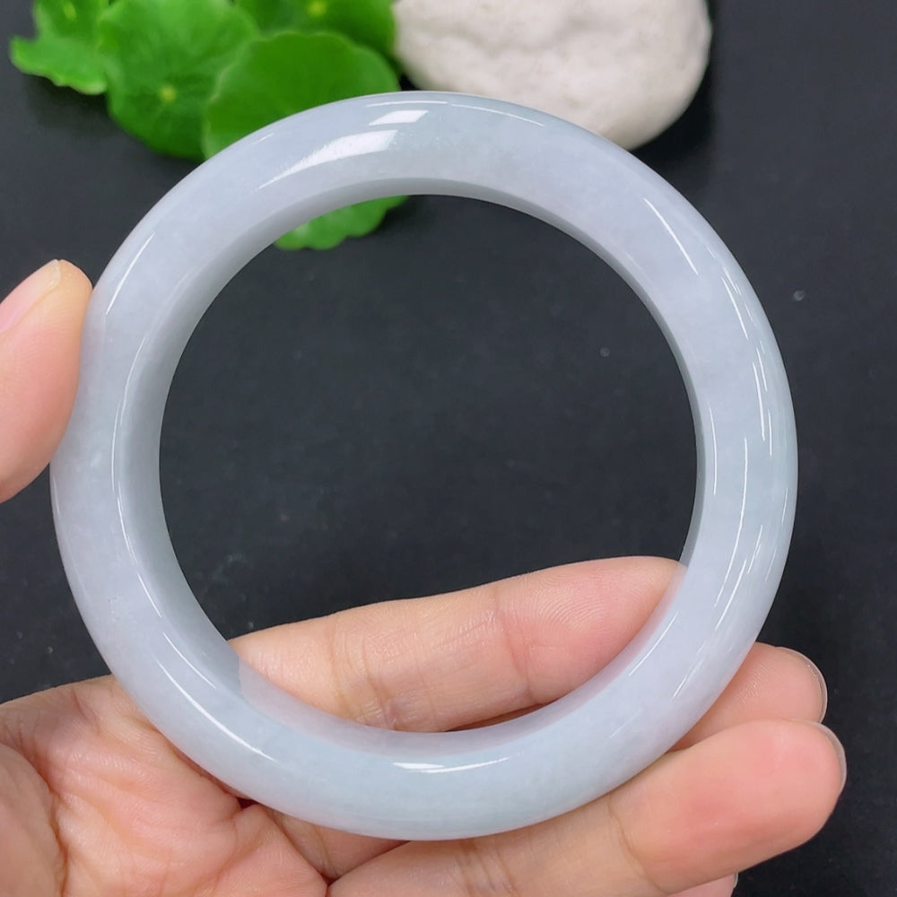 HKHQ jadeite round bangle in size 56.7, weighing 71.2g, featuring smooth, polished jadeite surface and classic circular design.