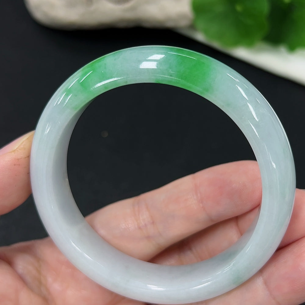 Jadeite round bracelet with size 53.8 and approximately 54g weight, featuring polished jade beads and a smooth finish.