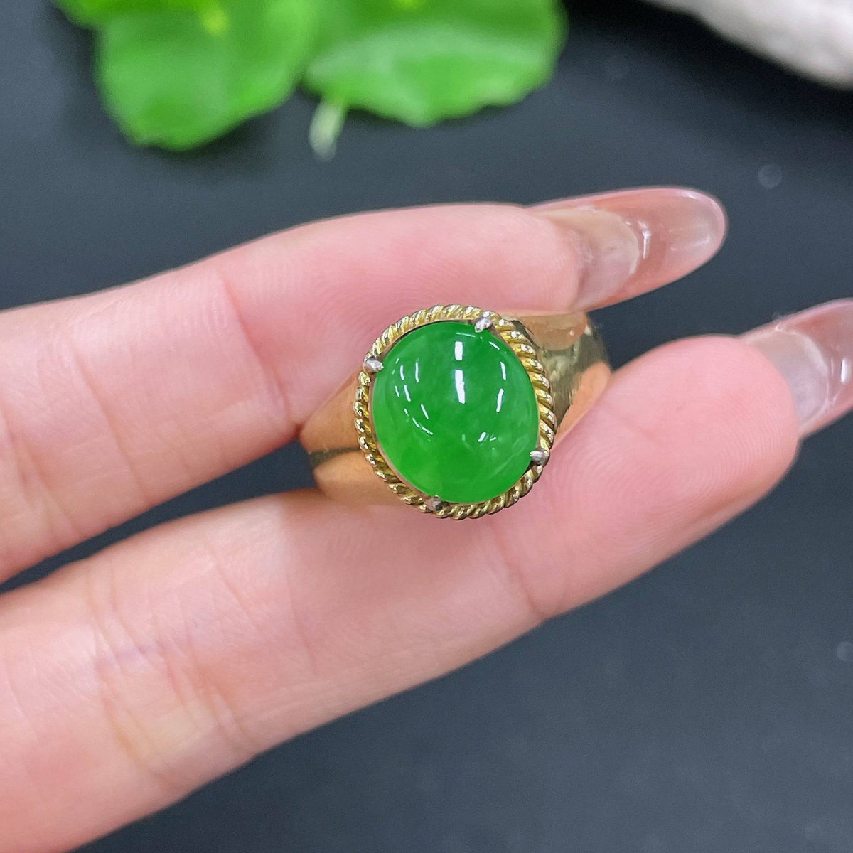 Jadeite cabochon from HUILIU HQ, non-gold, weighing approximately 12.26g, showcasing smooth, polished green jade stone.