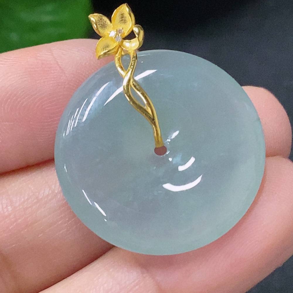 Jadeite pendant with peace knot design, 18K gold accents, diamond details, from HUILIU HQ, showcasing intricate craftsmanship.