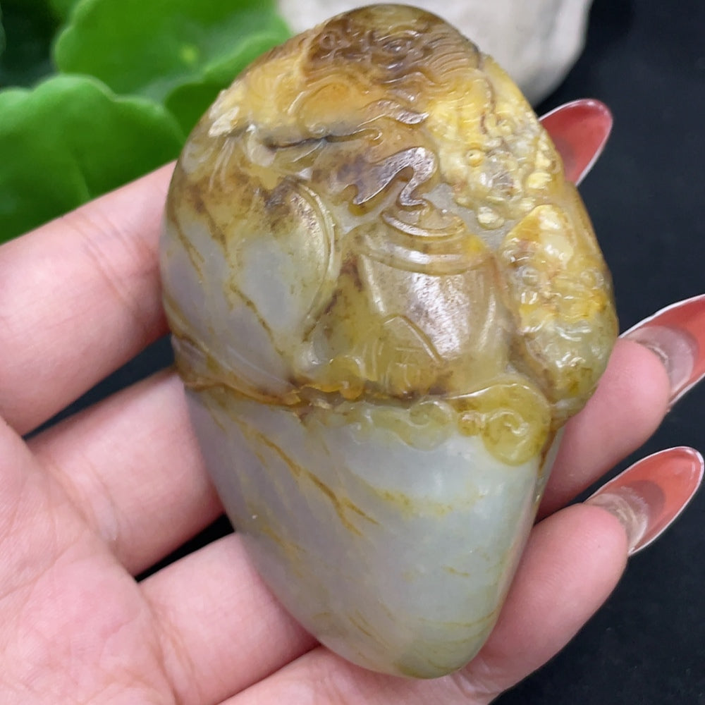 Huiliu certified Hetian Jade Zhong Kui carving, handheld artwork with smooth surface and natural skin color details.