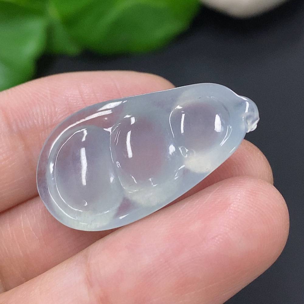 Huiliu Jadeite blessed bean inlay piece featuring intricate jade design, certified by Huiliu HQ, on a neutral background.
