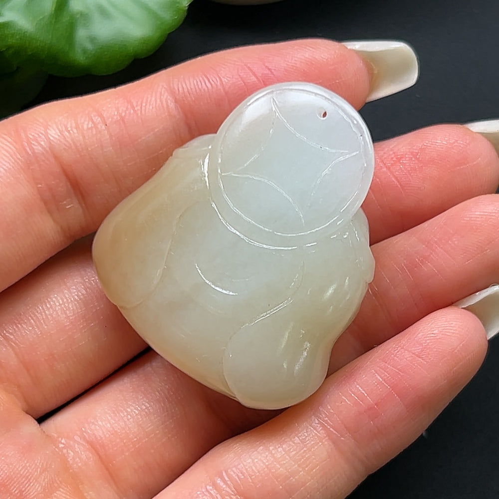 Hetian Jade Buddha pendant necklace from HKHQ featuring a polished jade Buddha charm on a delicate chain.