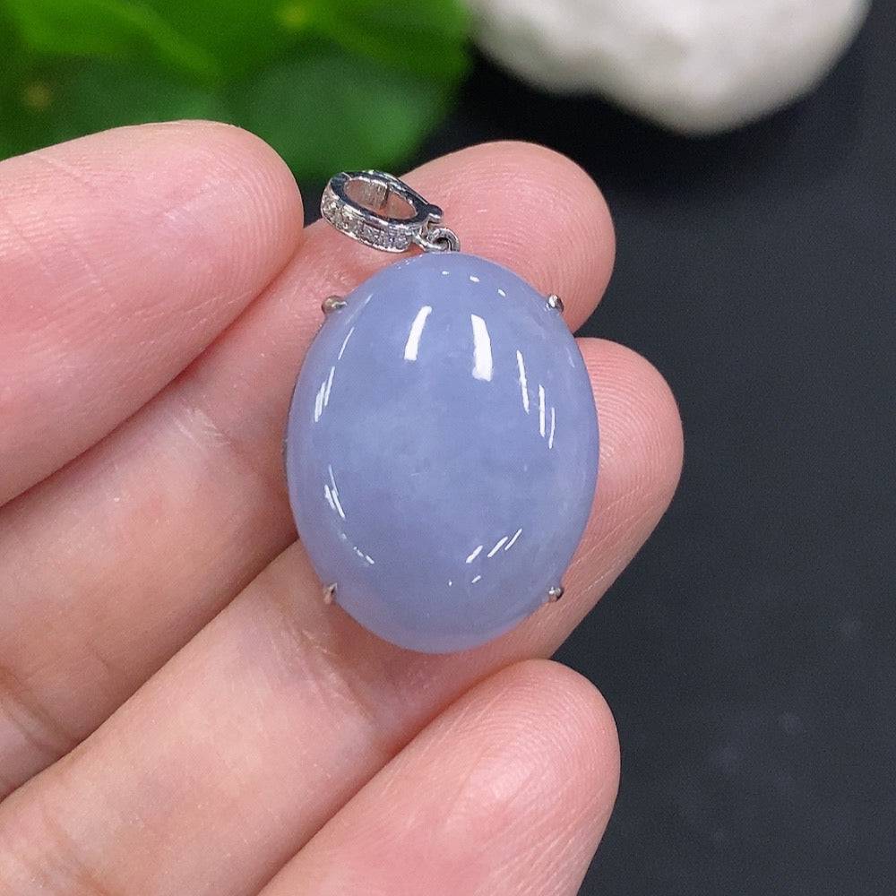 Jadeite cabochon pendant with diamond accents in 18k gold, weighing approximately 4.7g, featuring a polished jade gemstone.