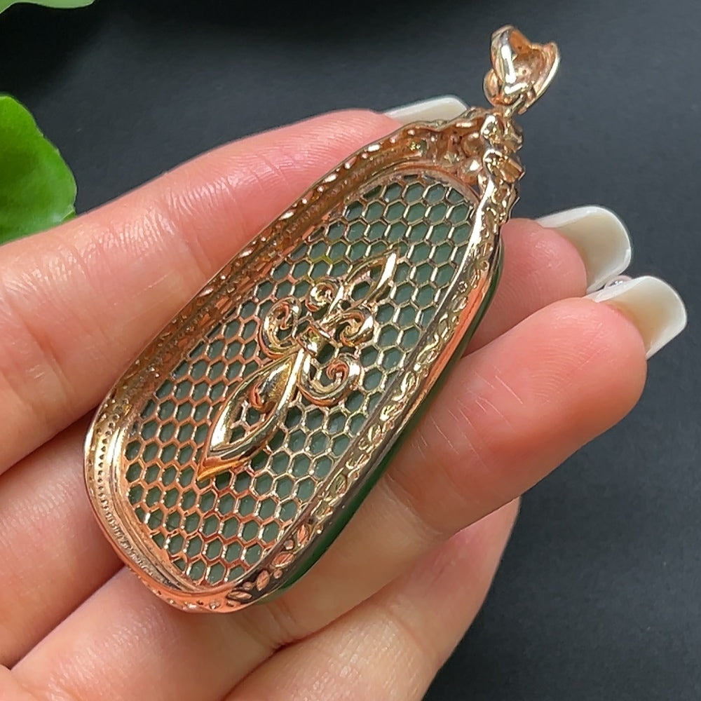Hetian Jade plain pendant with 18K gold and diamond inlay, showcasing elegant design on a necklace from HKHQ.