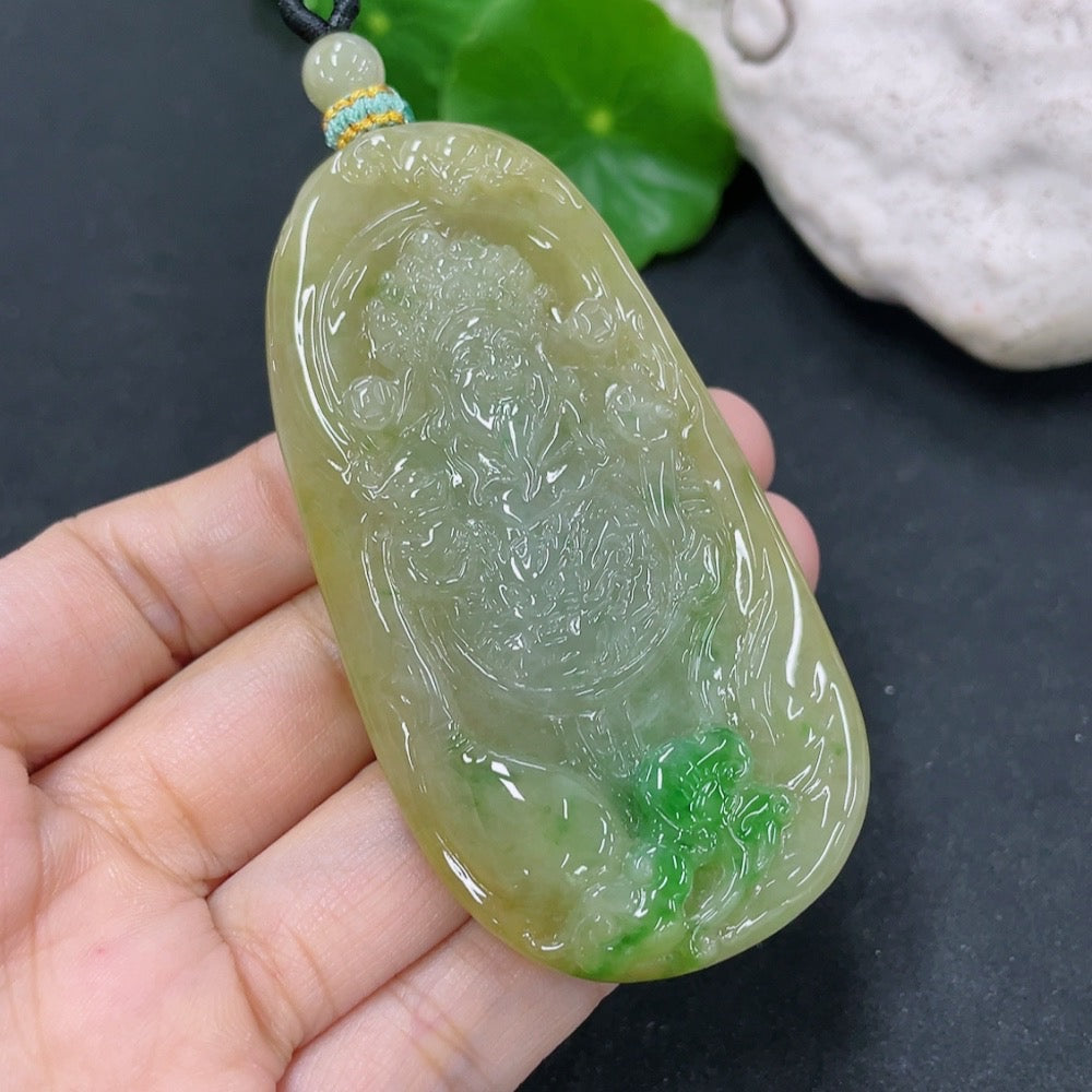 Jadeite pendant featuring the God of Wealth, weighing approximately 51.78g, with detailed green jade craftsmanship.