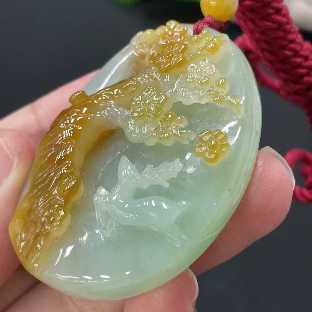 Huiliu Jadeite Deer Pendant featuring a detailed green jade deer design on a polished surface.