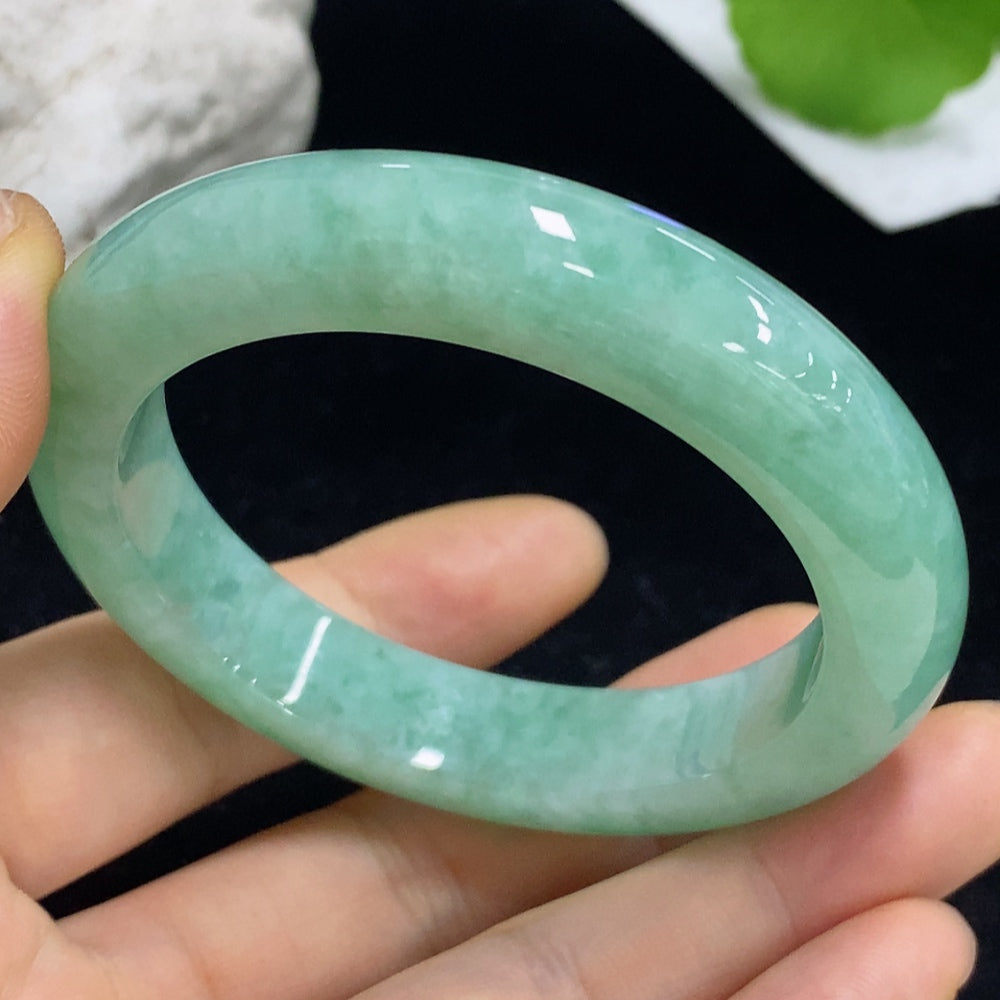 Jadeite round bracelet weighing 57.71g with size 53 from HKHQ, featuring polished jade beads on a string.