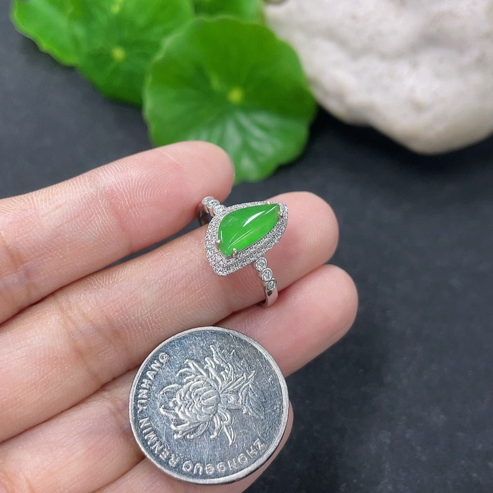 Jadeite ring with 18K gold band and diamond accents, size 13, HKHQ jewelry, showcasing intricate craftsmanship and elegant design.