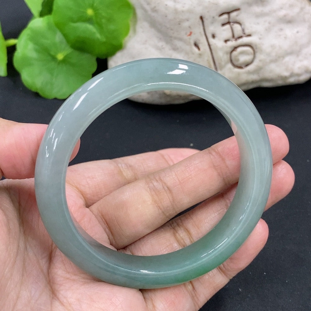 HKHQ jadeite round bangle, size 55.5, weighing 53.26g, smooth polished jadeite bracelet with a circular design.
