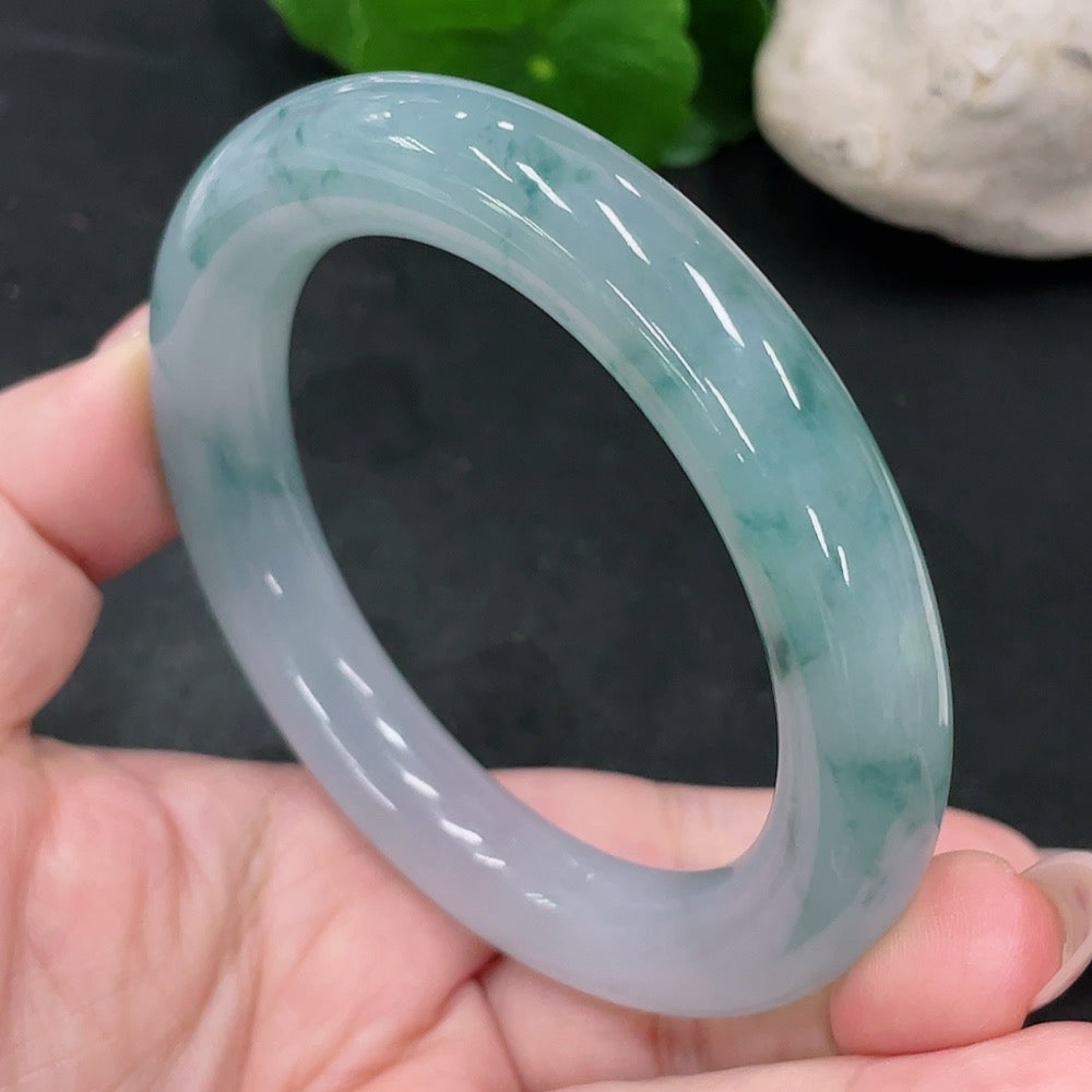 HUILIU HQ jadeite round bangle in size 56.8 with approximately 74.9g weight, showcasing smooth, polished green jade surface.