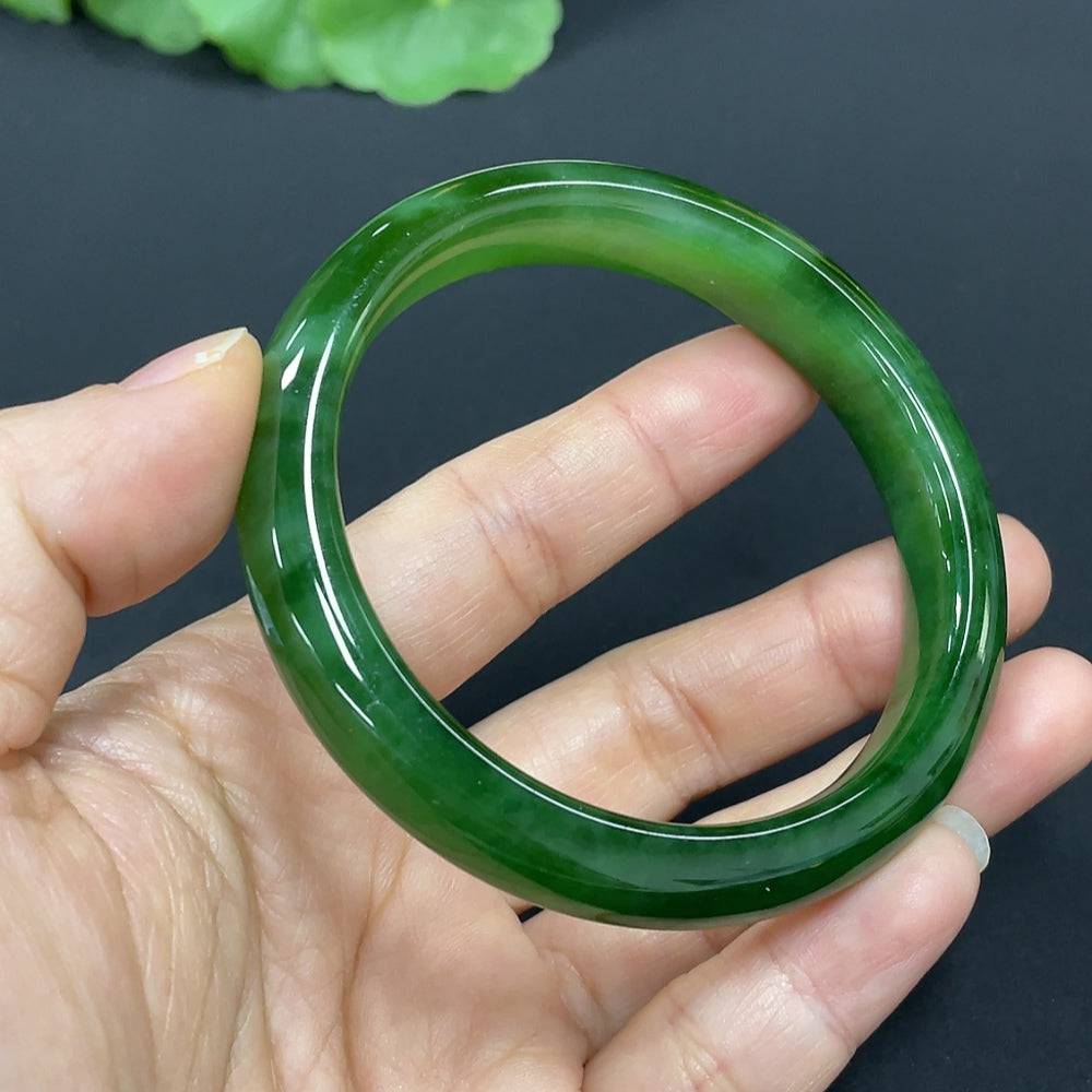 Huiliu certified Hetian jade round bracelet featuring smooth, polished jade beads on a delicate string.