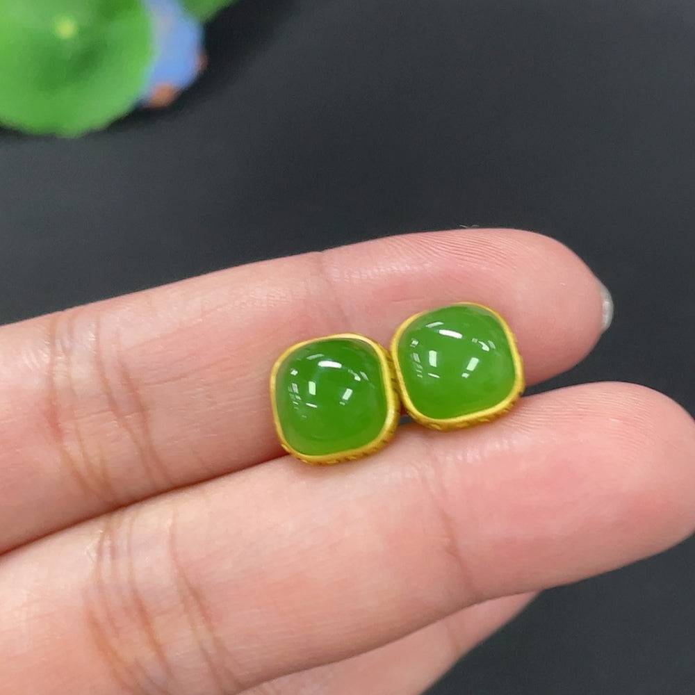 Huiliu certified Hetian jade jasper inlaid earrings featuring green and brown jade stones with intricate silver settings.