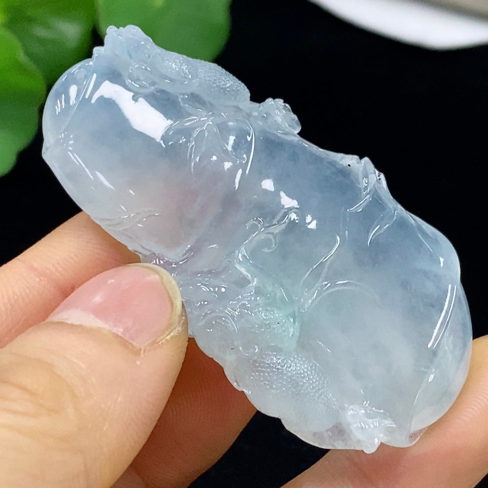 Jadeite bamboo pendant from HUILIU HQ showing detailed carved bamboo design, weighs approximately 25.8g, with a smooth polished surface.