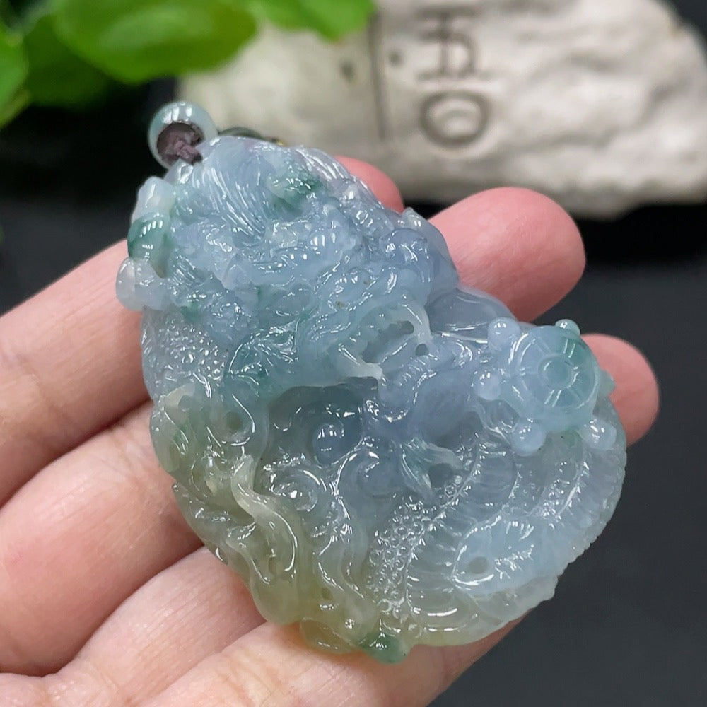 Jadeite dragon soaring pendant from HUILIU HQ with intricate dragon design, weighs approximately 46.3g including rope, master collection certificate