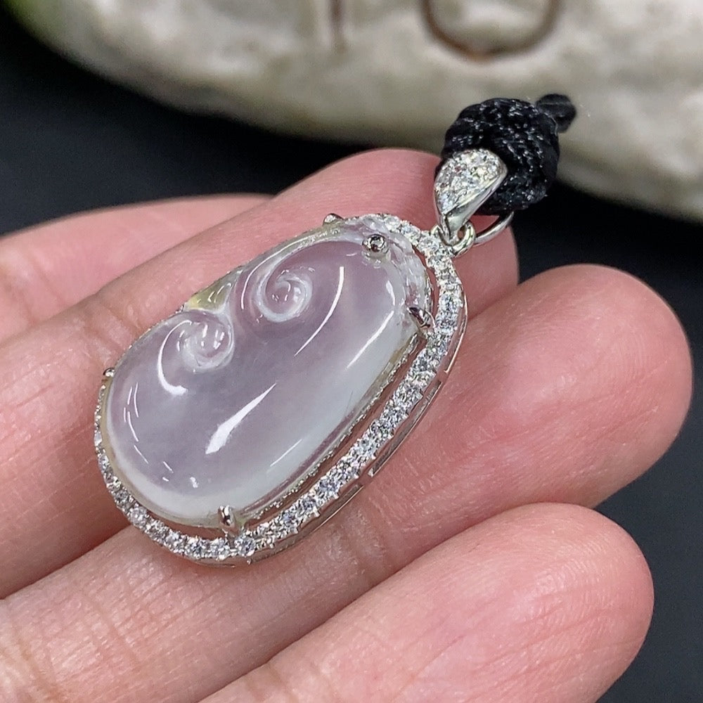 Jadeite Ruyi pendant with 18k gold accents and diamonds, featuring intricate inlaid jade design on a rope chain.