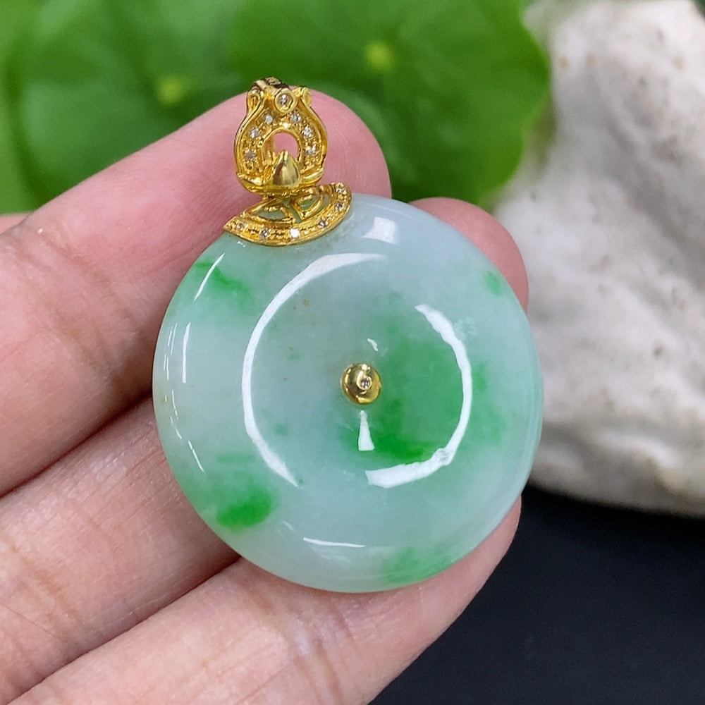 Jadeite peace knot pendant with 18K gold clasp and diamond accents, crafted by HKHQ, weighs approximately 8.55 grams.