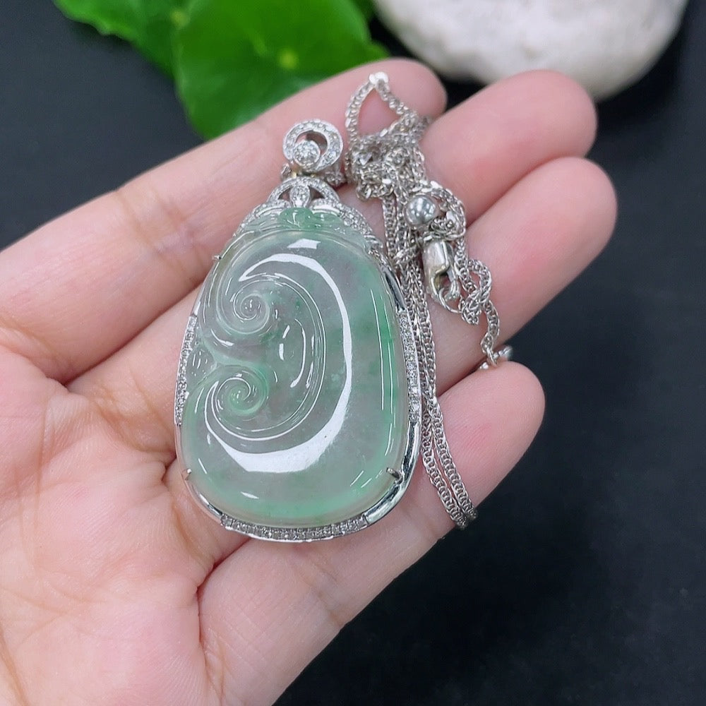 Jadeite Ruyi pendant with 18K gold and diamond accents, featuring intricate inlay work and a delicate chain.