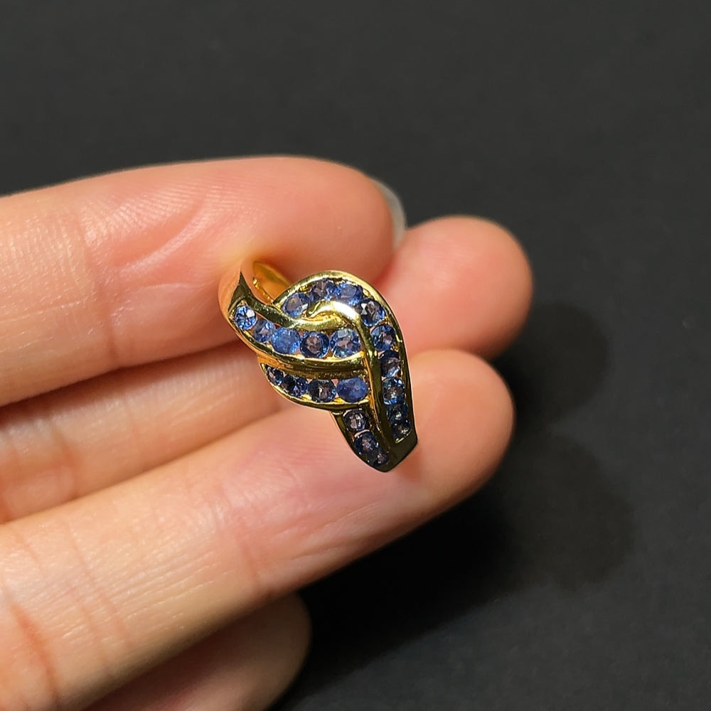 HKHQ sapphire ring with no hallmark, 3.65g, size 15.5, featuring a vibrant blue sapphire gemstone in a gold band.