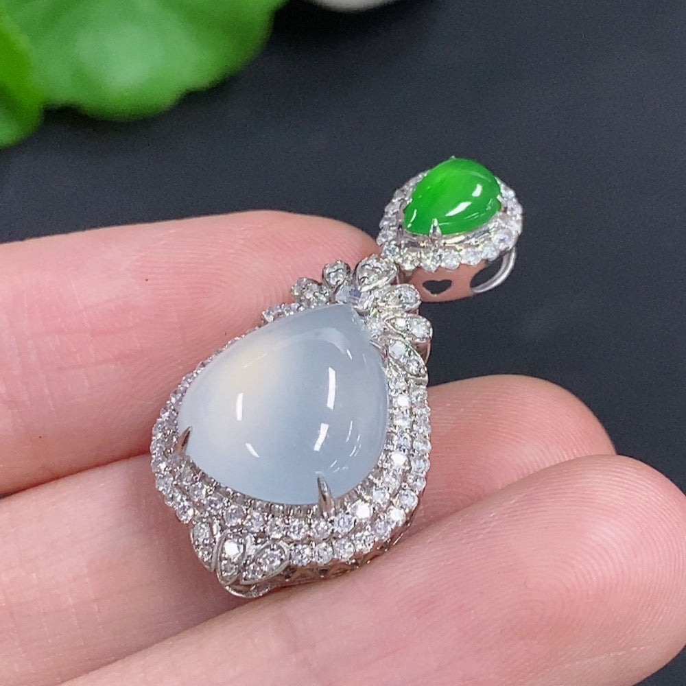Jadeite water drop pendant necklace with 18K gold and diamond accents, featuring a polished jadeite stone on a delicate chain.