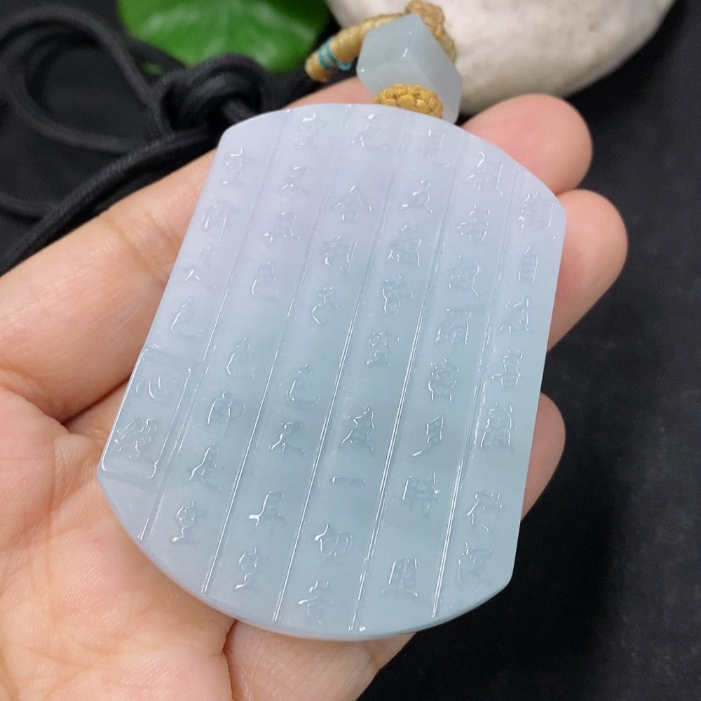 Jadeite pendant featuring Samantabhadra figure, 72.8g, intricate design, hanging on a necklace chain with detailed craftsmanship.