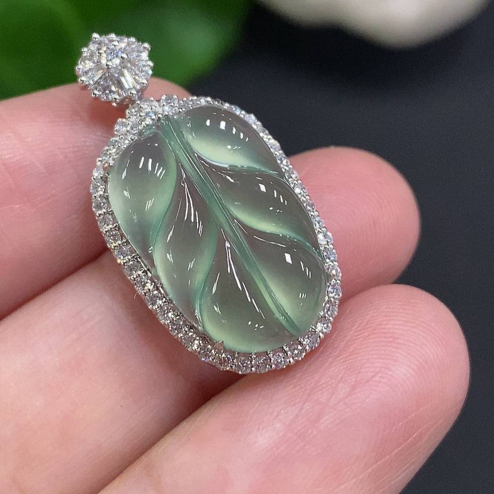 Huiliu Jadeite leaf pendant with diamond accents, featuring intricate leaf inlay and polished jade surface.