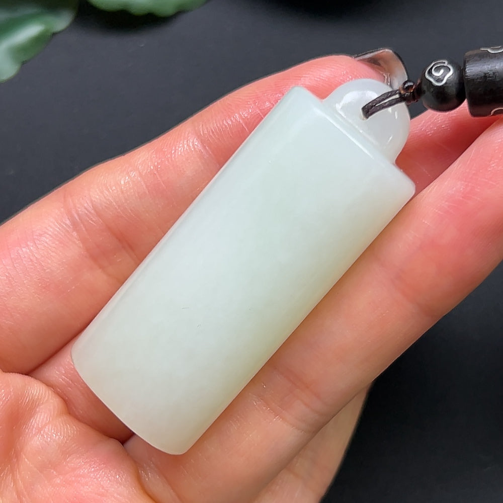 Hetian jade bamboo tube pendant necklace from HKHQ with rope, weighs approximately 38.6g, featuring a smooth jade finish and natural design.
