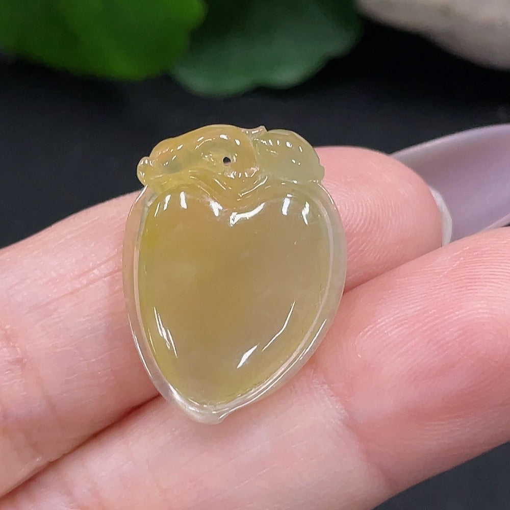 Jadeite pendant with fortune and longevity symbols, crafted by HUILIU HQ, featuring a smooth, polished jade surface.