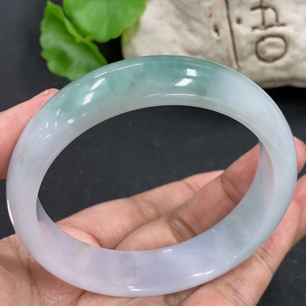 HKHQ jadeite round bracelet with smooth polished surface, 64.3g weight and size 59.4mm, featuring vibrant green jade beads.