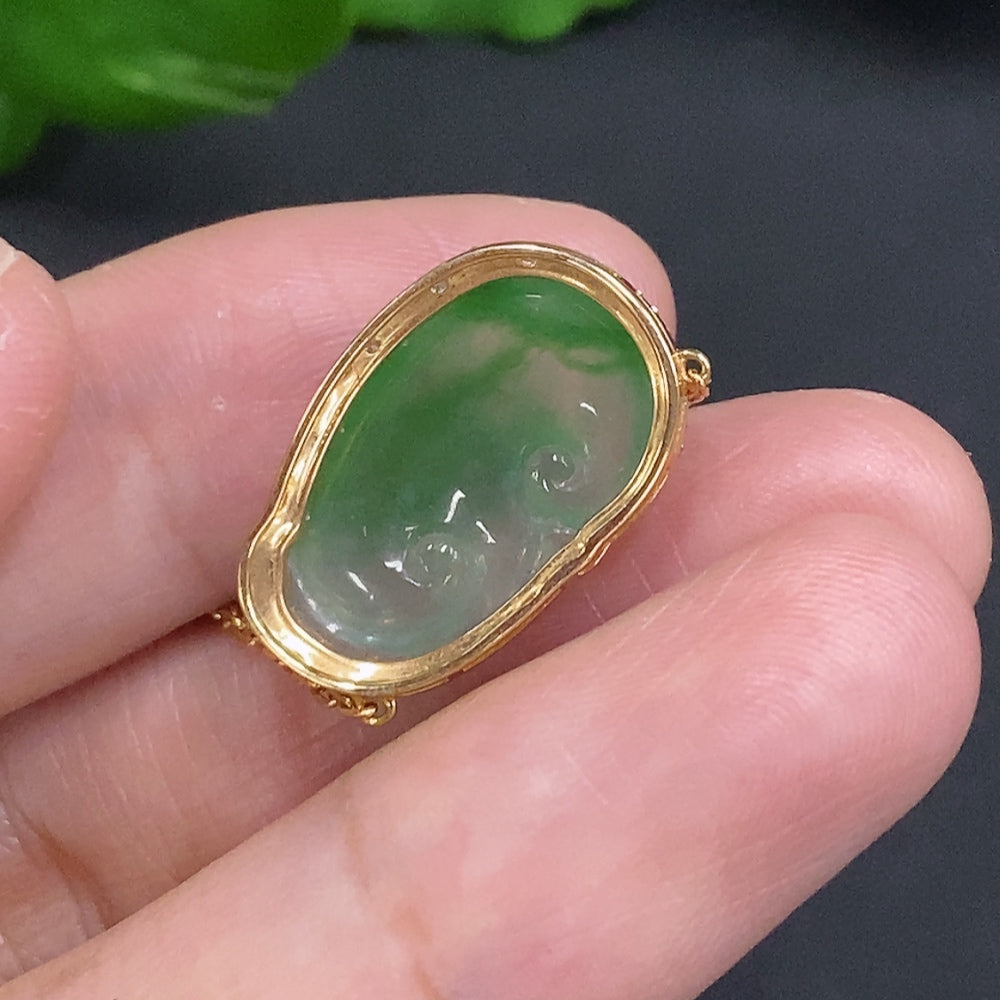 Huiliu Jadeite Ruyi pendant with diamond accents, inlaid design, showcasing intricate craftsmanship and vibrant green jade.