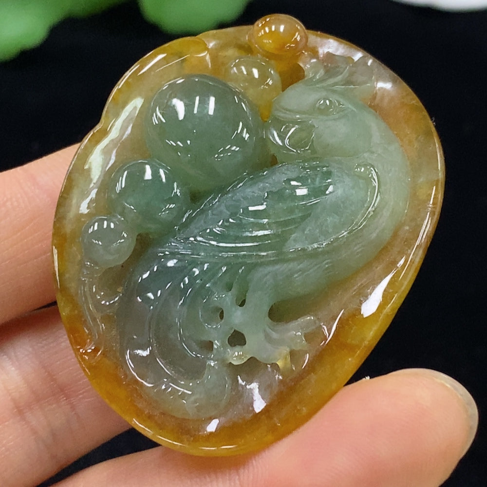 Huiliu certified jadeite pendant showing a smooth, polished green jade piece with natural variations and a secure attachment.