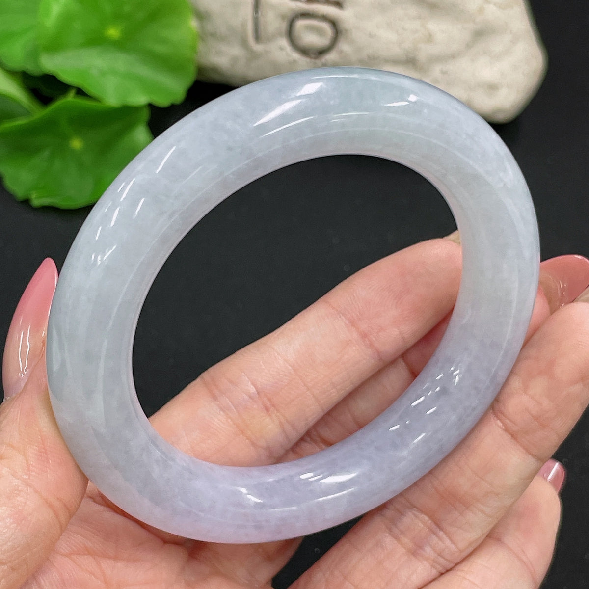 HKHQ jadeite round bangle, 70g, size 53, showcasing smooth, polished green jade with a glossy finish.