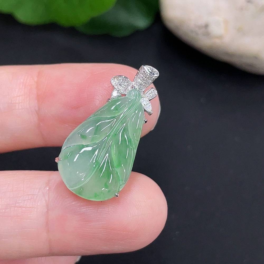 Large green jade pendant from HUILIU HQ featuring smooth, polished surface and natural jade coloration.