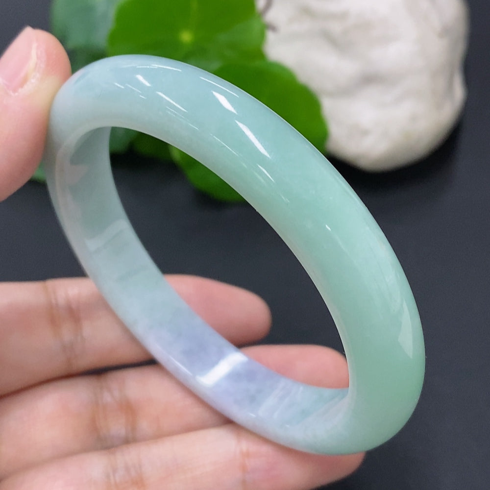 Jadeite round bracelet by HKHQ with size 56.6 and weight 48.4g, showcasing smooth, polished green jade beads.