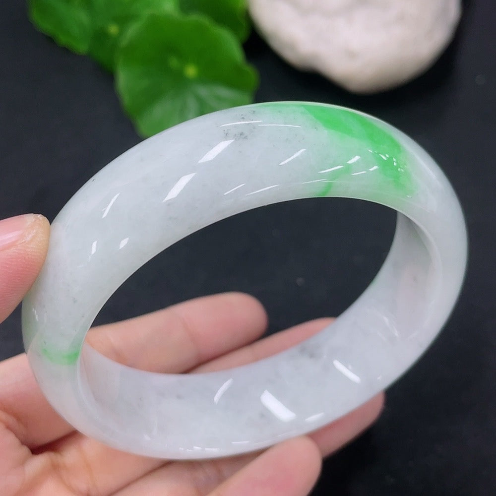 Jadeite round bangle bracelet in size 56, weighing 70.83g, crafted by HKHQ, featuring smooth, polished jadeite surface.